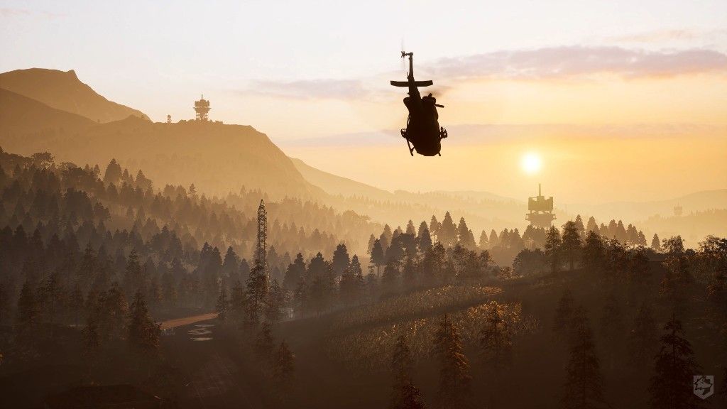 Helicopter silhouette against sunset